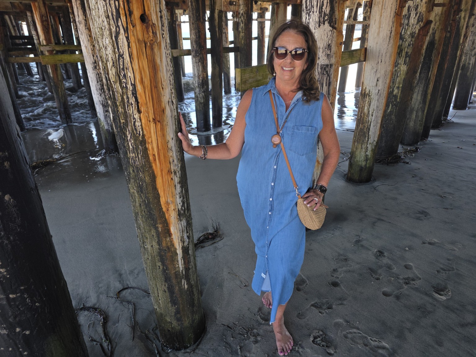 Darlene outdoors by the coast
